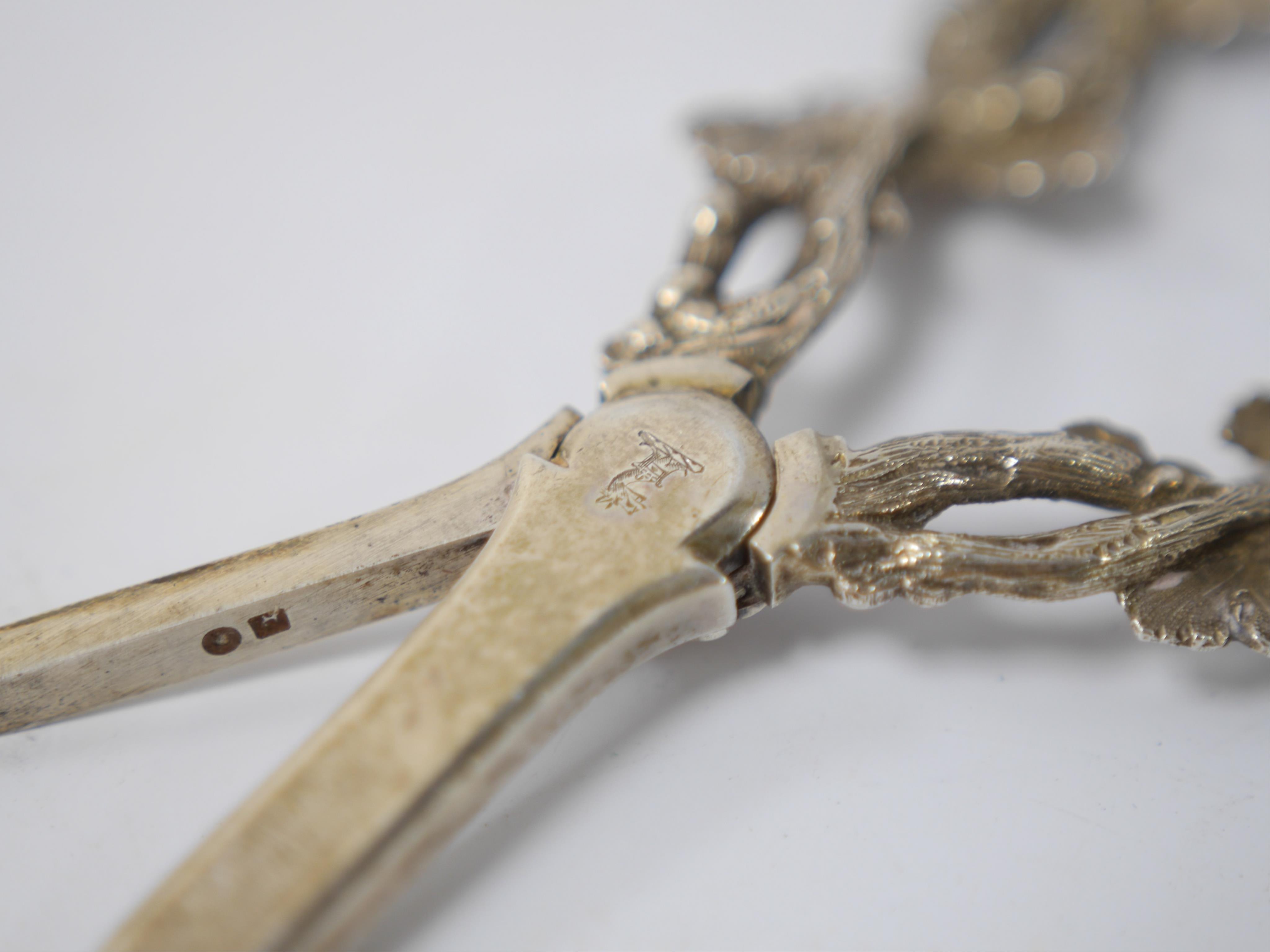 A pair of Victorian silver grape shears with fruiting vine handles, Martin, Hall & Co, Sheffield, 1884, 17.1cm. Condition - good